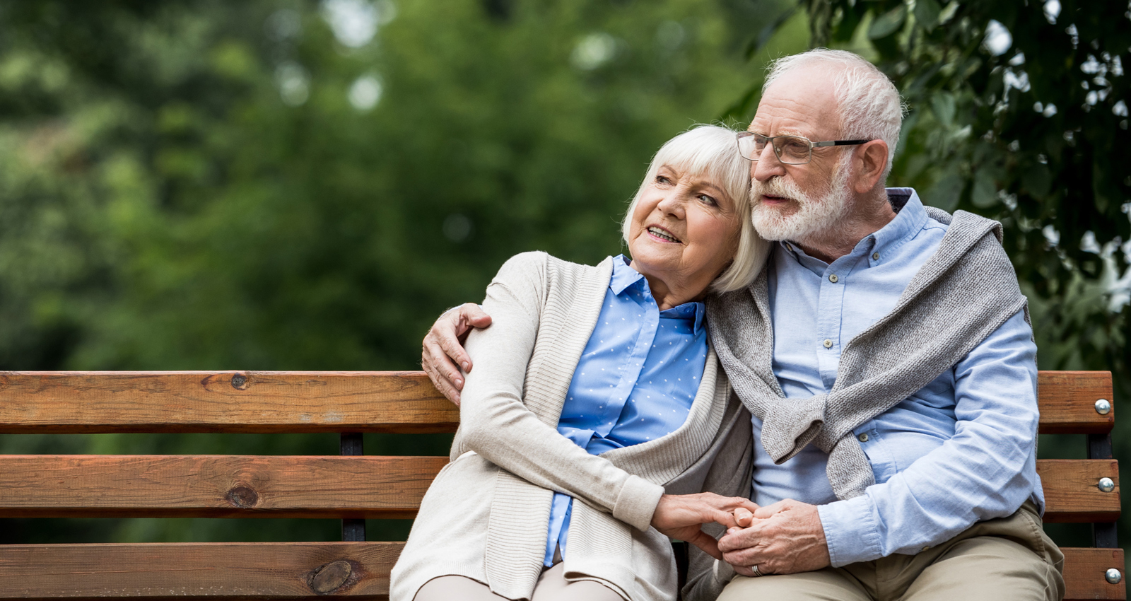 Senior couple on park bench